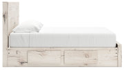 Signature Design by Ashley Lawroy panel bed with built-in storage drawers and a modern wood finish in a bedroom setting.