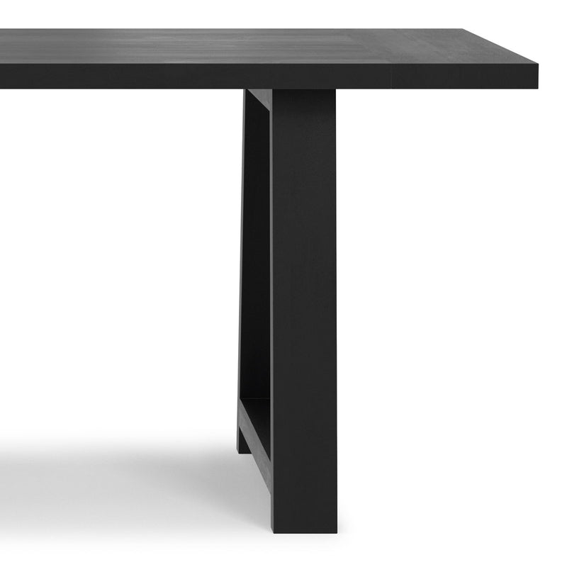 Simpli-Home Whitley dining table with a wooden surface and sturdy legs, ideal for modern dining rooms.