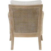 White Uttermost Encore natural armchair with plush cushioning and wooden legs, showcasing a modern, elegant design.
