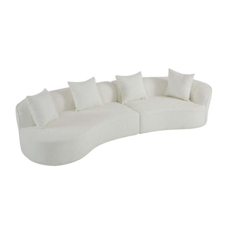 Elegant curved sectional sofa by Noble House with plush foam cushions, showcasing a stylish stationary sofa design in a modern living room.