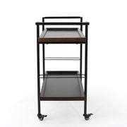 Modern industrial Noble House bar cart with shelving and casters, featuring a sleek metal frame and wooden shelves for stylish beverage storage.
