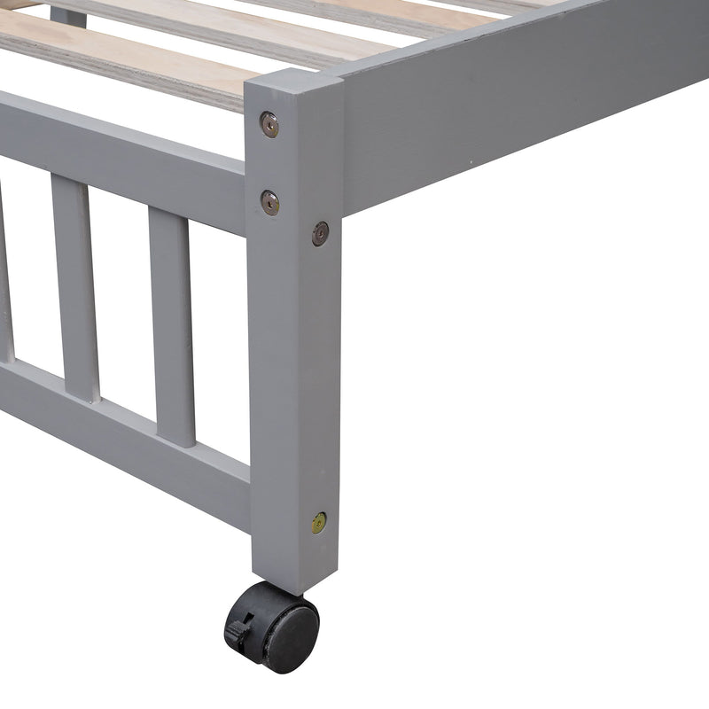 DreamHaus bunk bed with six drawers, flexible shelves, and a bottom bed on wheels, featuring sturdy wooden construction.