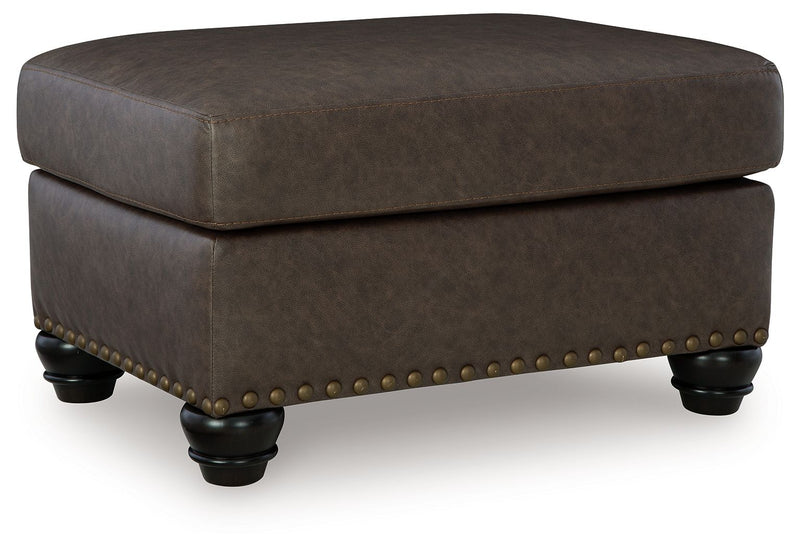 Benchcraft Roxmere living room set with stationary chair and matching ottoman, featuring plush upholstery and modern design.