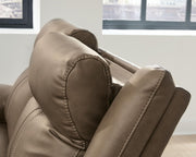 Signature Design by Ashley Max-Momentum reclining sectional sofa with plush cushions and reclining features in a modern living room setting.