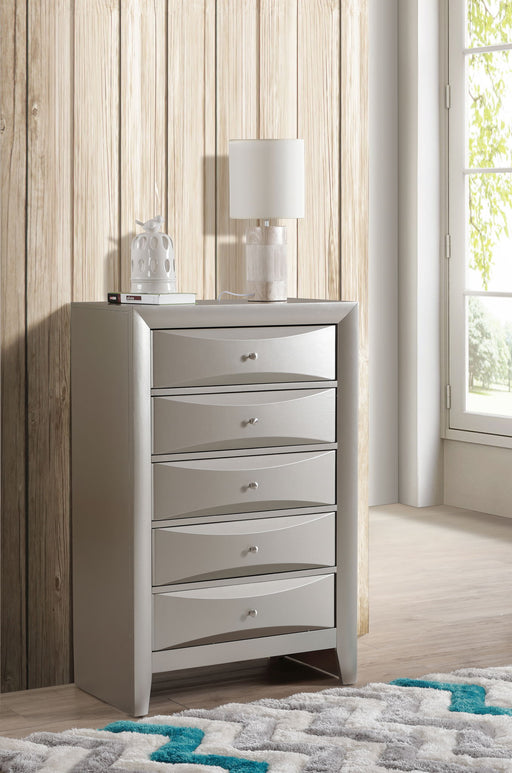 Marilla accent chest by Glory Furniture featuring a stylish wooden design with multiple drawers and decorative hardware.