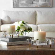 Set of two beige crystal block candleholders by Uttermost, featuring modern geometric glass design for candles or decorative use.