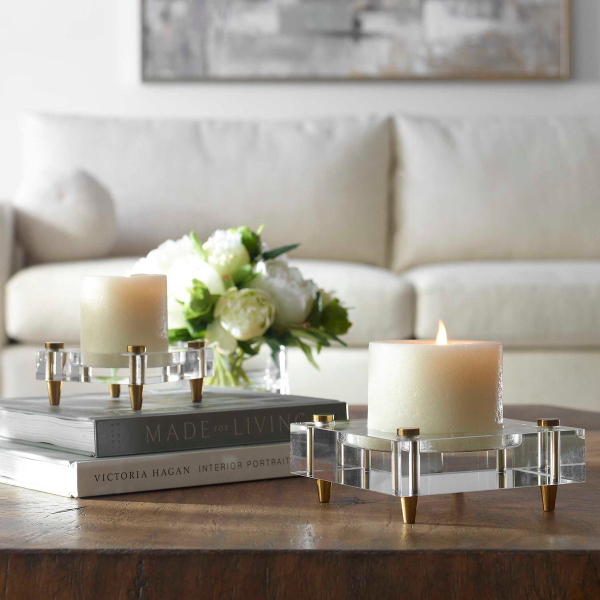 Set of two beige crystal block candleholders by Uttermost, featuring modern geometric glass design for candles or decorative use.