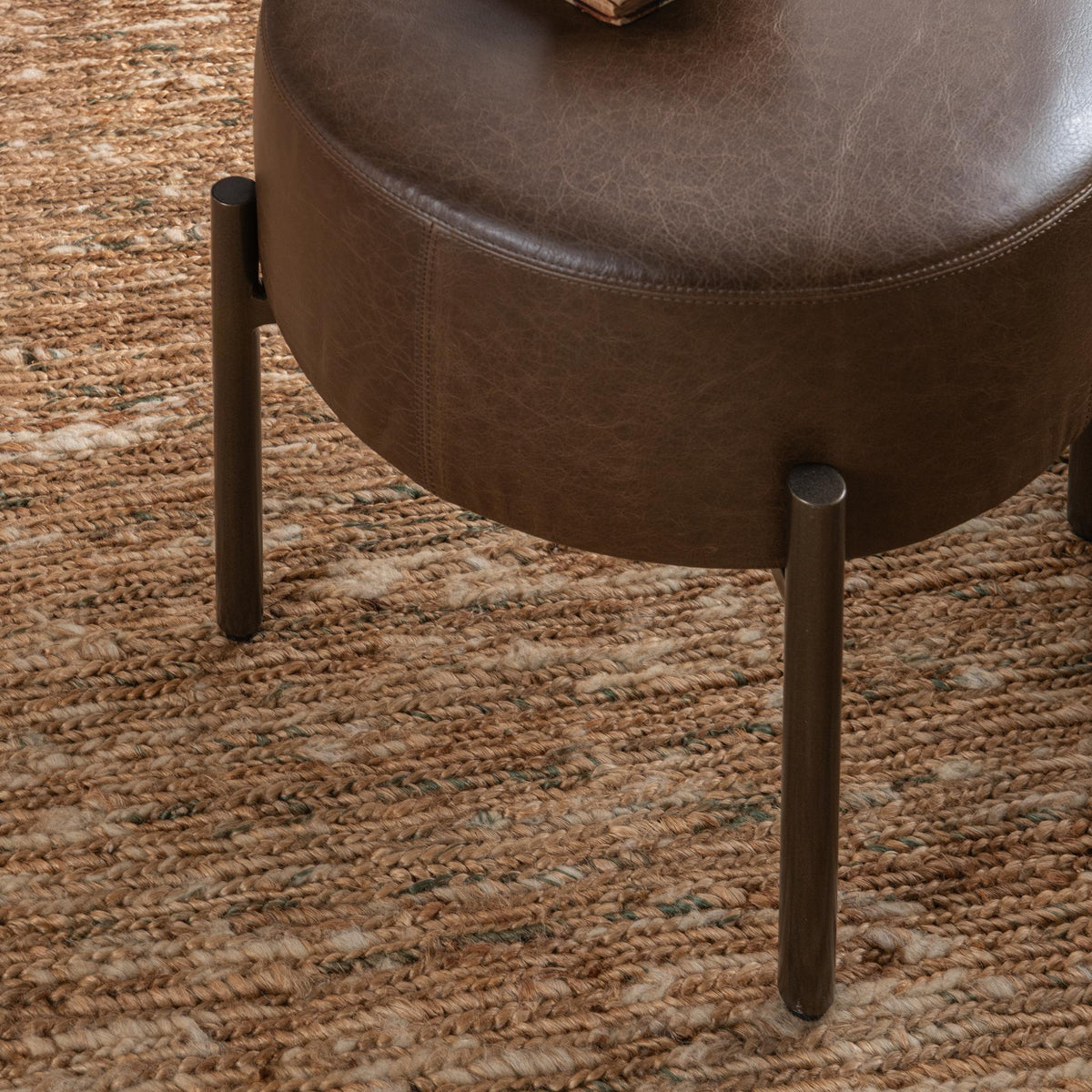 Classic Home Aimie accent stool with a woven fabric seat and wooden legs, ideal for living room or entryway decor.