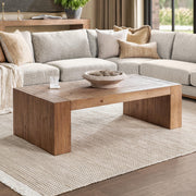 Classic Home Clayton coffee table for living room, featuring a sleek wooden design and modern style in a cozy interior setting.