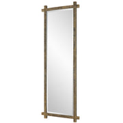 Uttermost Abanu ribbed dressing mirror vanity mirror with a sleek, modern design and ribbed frame, suitable for bedroom or dressing area.