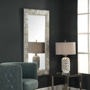 Silver Maeona metallic wall mirror by Uttermost with a sleek, reflective surface and modern round shape.