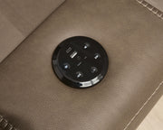 Signature Design by Ashley Max-Momentum reclining sectional sofa with plush cushions and recliner mechanisms in a modern living room setting.