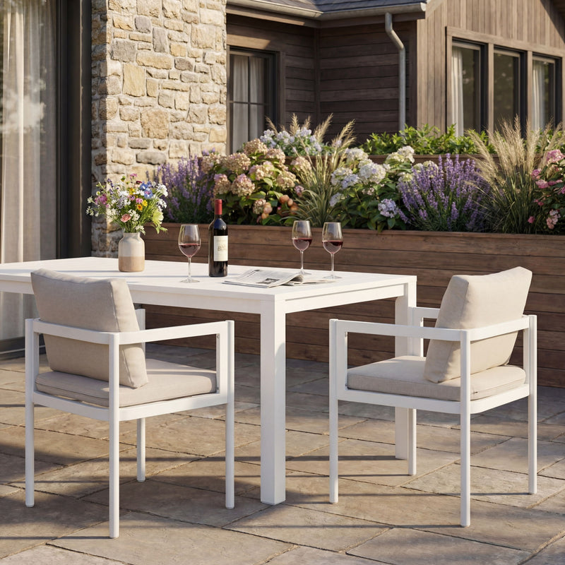 Set of two Noble House all-weather outdoor dining chairs with armrests and slatted seats, ideal for patio or garden dining.
