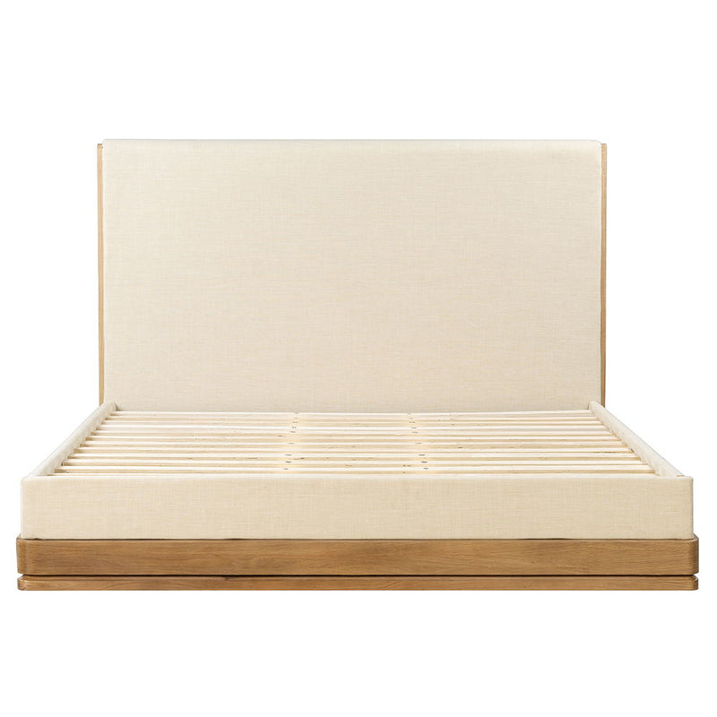 ACME Zoey upholstered bed with a padded headboard and neutral fabric, showcasing a modern bedroom furniture design.