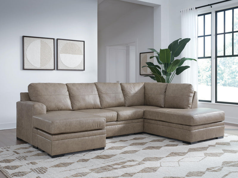 Stationary sectional sofa from Signature Design by Ashley®, featuring plush cushions and modern design in neutral fabric.