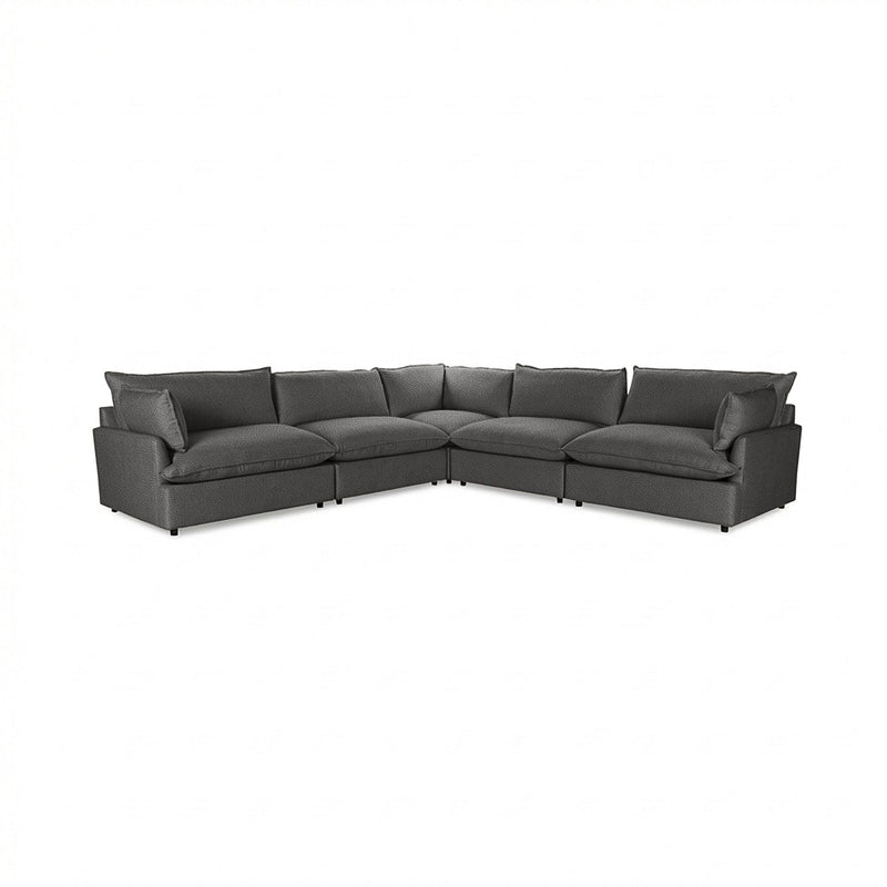 Classic Home Caplan modular sectional sofa with beige fabric upholstery and plush cushions in a modern living room setting.