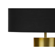 Contemporary black and gold concrete table lamp with sleek design, perfect for modern home lighting by 8th Street.