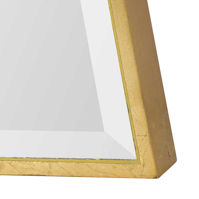 Gold wall mirror by Uttermost featuring a sleek, mirror frame with a modern, stylish design.