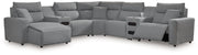 Signature Design by Ashley Modmax II reclining sectional in salt and pepper fabric, featuring multiple reclining seats and plush cushions.