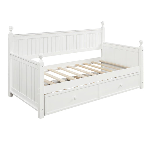 White twin size DreamHaus daybed with matching twin trundle, featuring a sleek modern design and sturdy wooden frame.