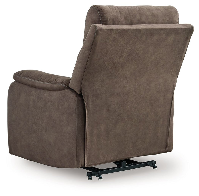 Signature Design by Ashley Crestmeade Power Lift Recliner in plush upholstery with padded armrests and a sturdy lift mechanism.