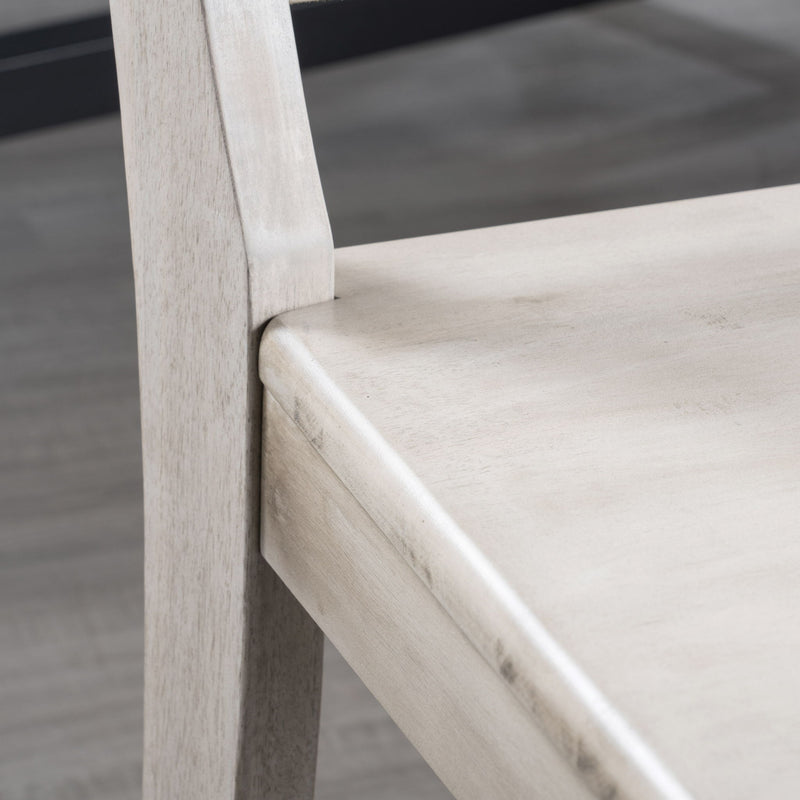 Set of two Noble House Plethora dining chairs with X-shaped back, modern wood design, ideal for kitchen or dining room seating.