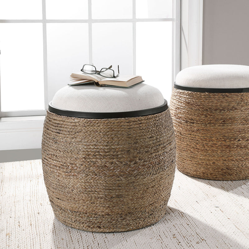 Uttermost Island straw accent stool with white and light brown woven design, versatile for living room or bedroom decor.