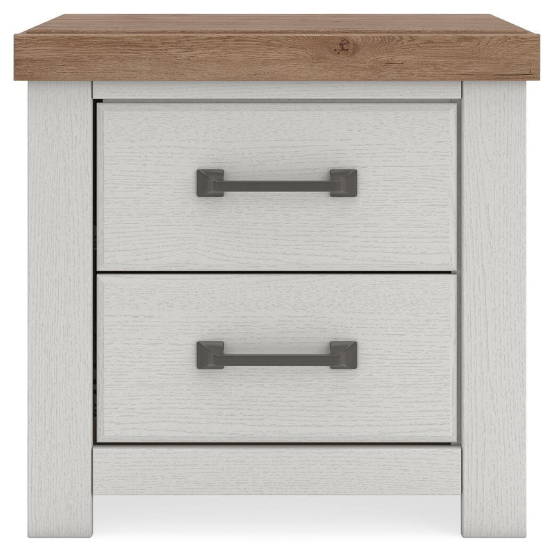 Benchcraft Savonport two-drawer nightstand with charging station in white and brown, featuring a modern design and functional storage.