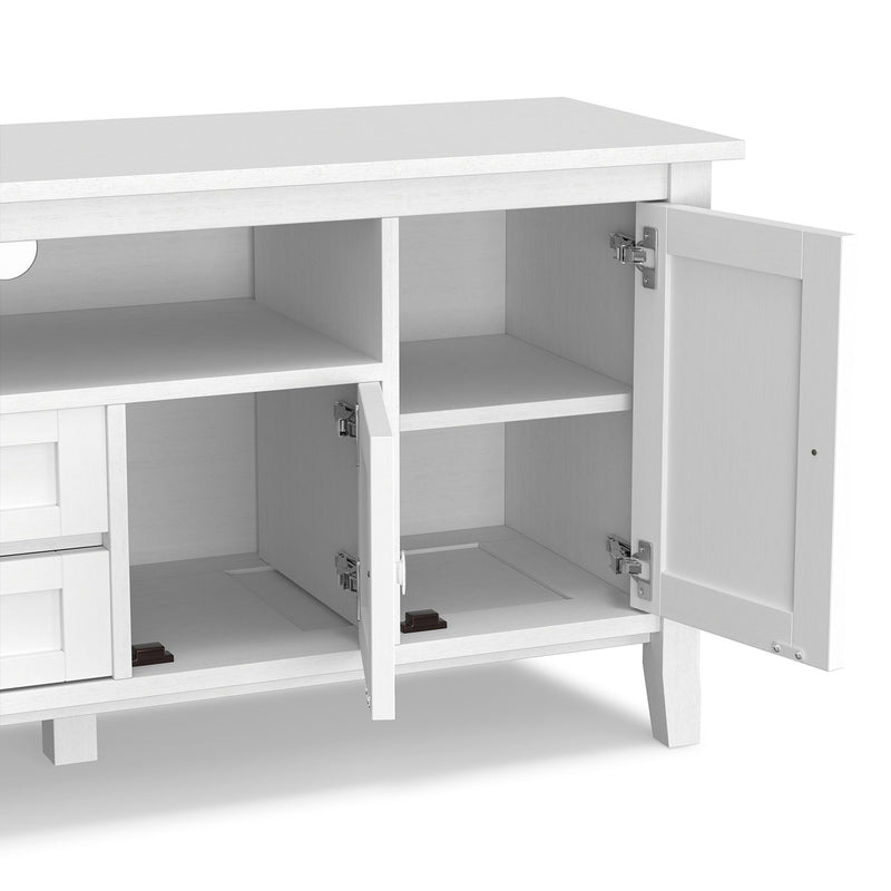 Handcrafted Warm Shaker TV media stand by Simpli-Home with open shelves and storage compartments, made of warm-toned wood
