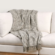 Classic Home Sharma natural throw blanket with soft, cozy fabric and neutral tones, perfect for adding warmth to any space.