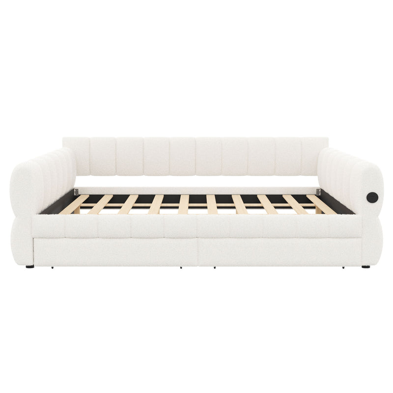 Dreamland upholstered platform bed with built-in USB charging ports and two storage drawers, shown in a modern bedroom setting.