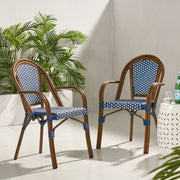 Set of two Noble House bistro chairs with white and navy two-toned checkered fabric seats and white painted wooden frames.
