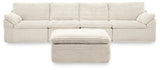 Ivory Fannin 4-piece sectional with Ottoman from Signature Design by Ashley, featuring plush cushions and modern design.