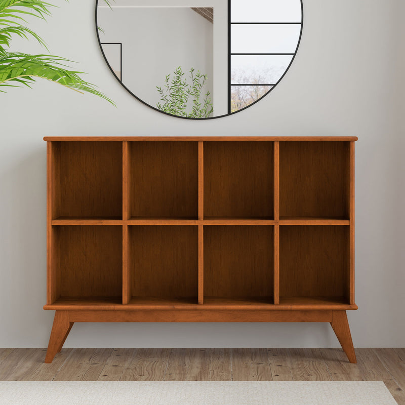 Simpli-Home Draper handcrafted low cube bookcase with multiple compartments for organizing books and decor.