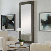 Gray Figaro oversized accent mirror by Uttermost featuring a bold, decorative frame with intricate detailing.