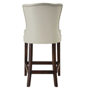 Uttermost Dariela white counter stool with a modern design, featuring a cushioned seat and sleek metal legs for counter height use.