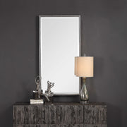 Silver metallic wall mirror by Uttermost with a modern, reflective surface and sleek frame design.