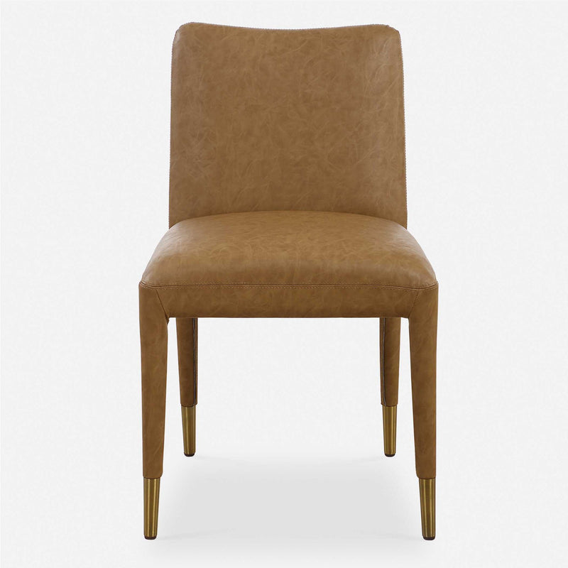 Set of two Uttermost Conifer dining chairs with upholstered seats and wooden legs, stylish and comfortable for modern dining rooms.