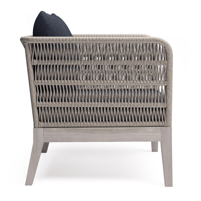 Slate gray outdoor conversation arm chair from Simpli-Home Santiago collection with cushioned seating and armrests.