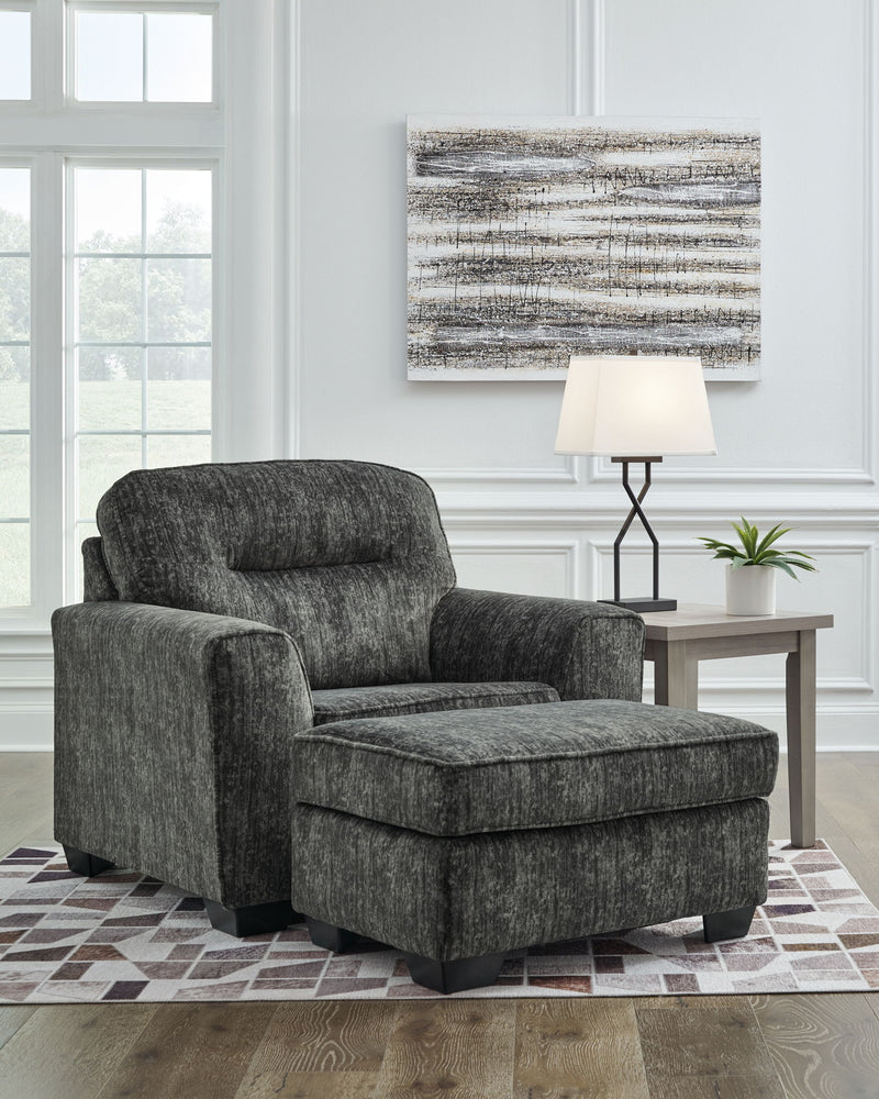 Signature Design by Ashley Lonoke chair and a half with matching ottoman, stationary upholstered furniture in a cozy living room setting.