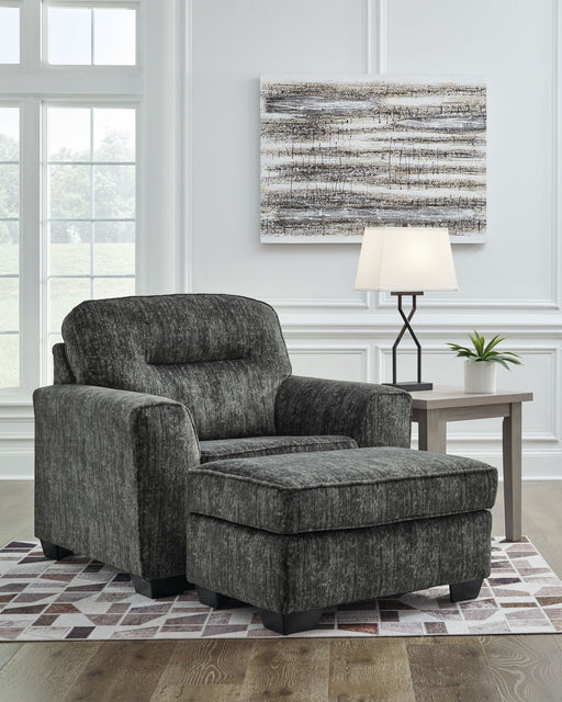 Signature Design by Ashley Lonoke chair and a half with matching ottoman, stationary upholstered furniture in a cozy living room setting.