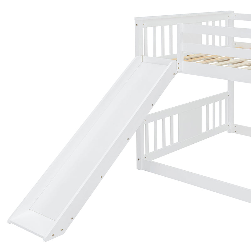 White DreamHaus full over full bunk bed with ladder and slide, showcasing the sturdy frame and playful design for kids' bedroom.