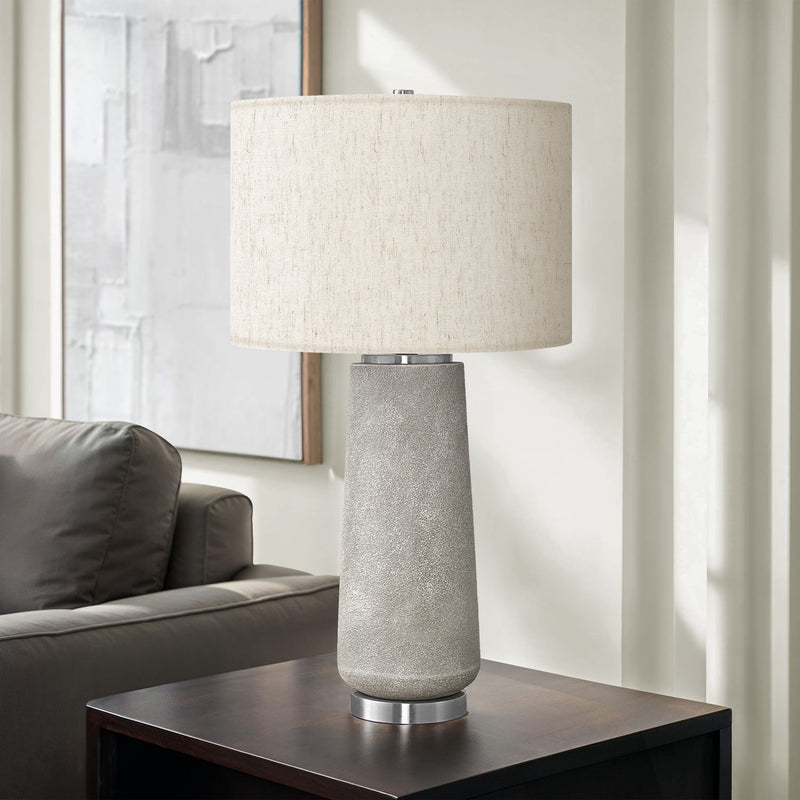 Modern gray resin table lamp by 8th Street, featuring a sleek design and contemporary style for home lighting.