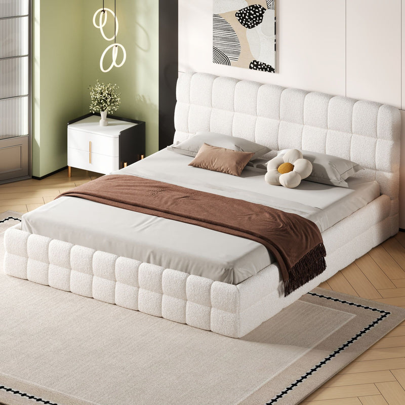 Dreamland upholstered platform bed with padded headboard, showcasing a modern bedroom setup with soft fabric upholstery and clean lines.