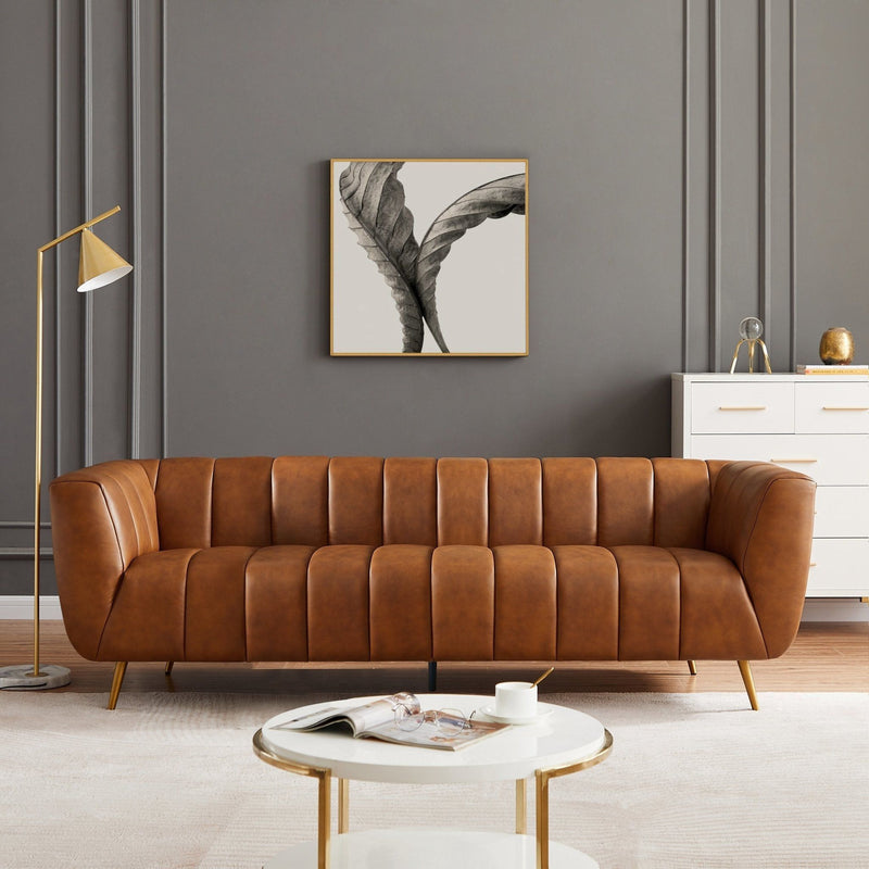 Ashcroft Furniture Ava sofa in gold and tan, stationary sofa with plush cushions, modern design, and stylish upholstery.