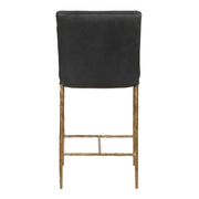 Uttermost Ascend counter stool with wooden legs and upholstered seat in natural fabric, 24-27 inch height, modern design.