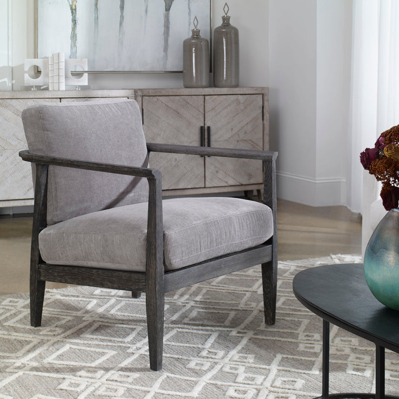Gray Uttermost Brunei modern accent chair with sleek design and cushioned seat, perfect for contemporary living spaces.