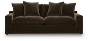 Benchcraft Maxton Heights stationary sofa with plush cushions and modern design, shown in a living room setting.