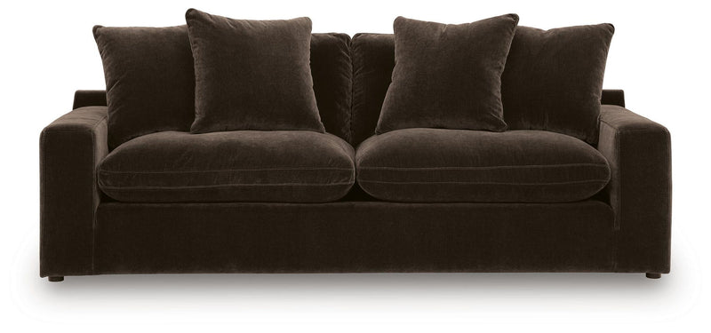 Benchcraft Maxton Heights stationary sofa with plush cushions and modern design, shown in a living room setting.