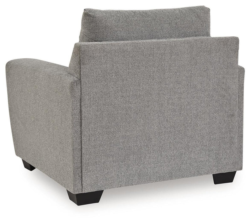 Benchcraft arm chair with plush fabric upholstery and modern design, featuring a sturdy wooden frame and comfortable cushioning.